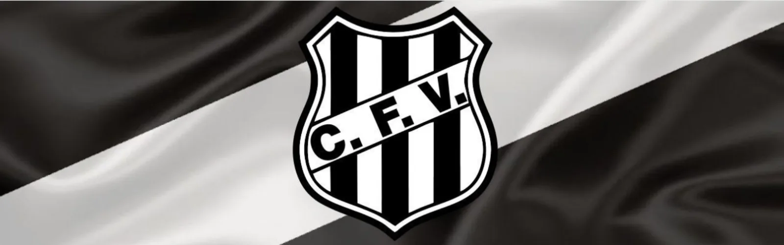 Bandeira preta e branca com o escudo C.F.V. da clínica